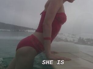 SHE_IS